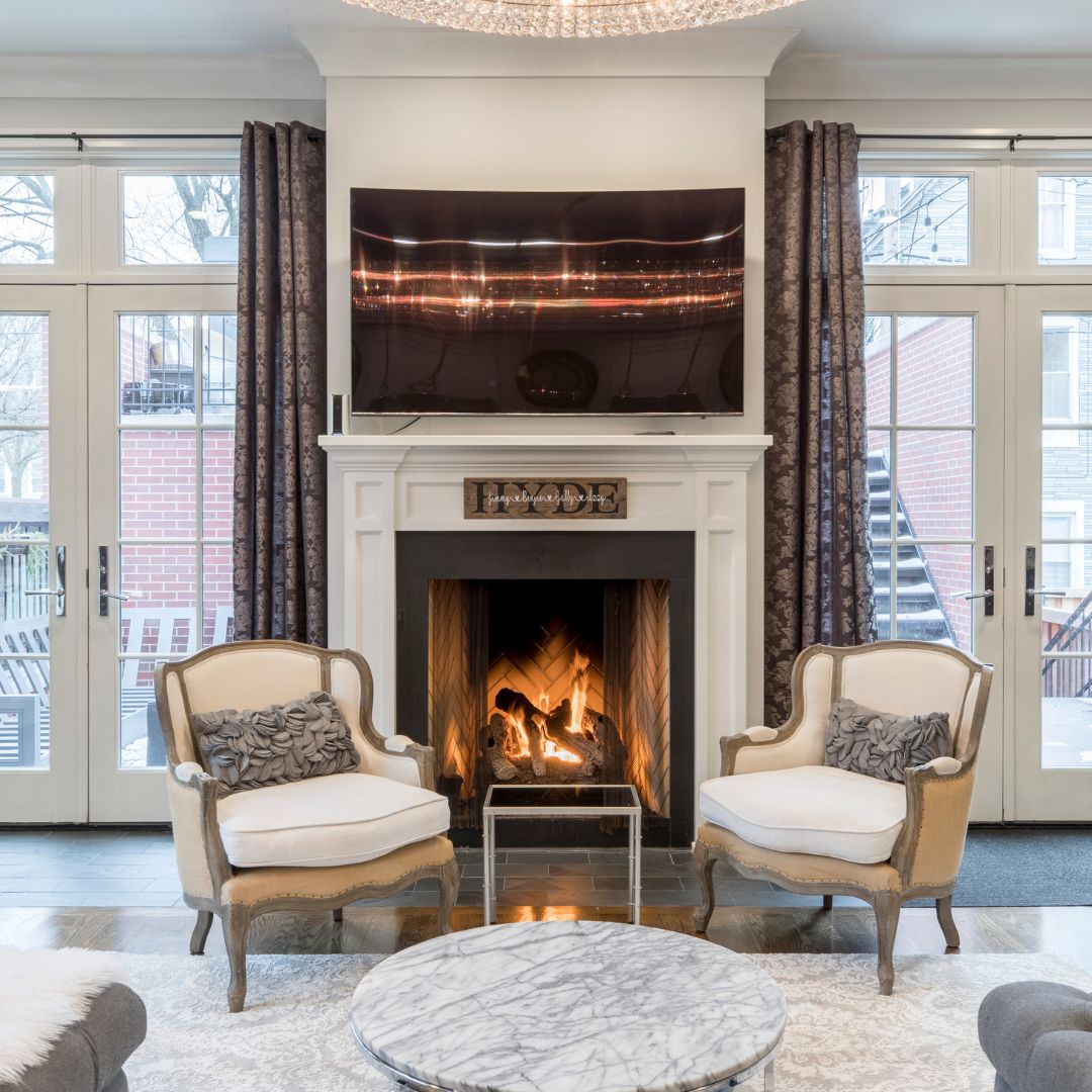 chairs by fireplace
