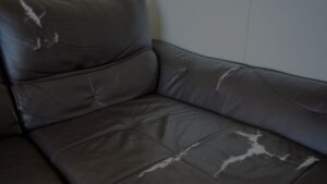 torn leather furniture